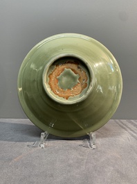 A Chinese Longquan celadon dish and a plate with floral design, Ming