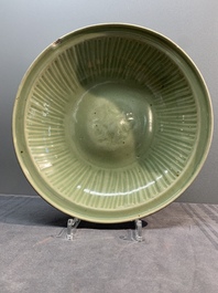 A Chinese Longquan celadon dish and a plate with floral design, Ming