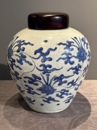 A Chinese blue and white 'lotus scroll' vase with wooden cover, Kangxi