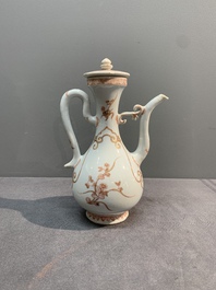 A Chinese iron-red and gilt-decorated ewer with floral design, Kangxi