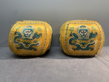 A pair of Chinese yellow-ground embroidered silk 'dragon' cushions, 19th C.