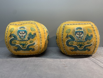 A pair of Chinese yellow-ground embroidered silk 'dragon' cushions, 19th C.