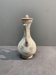 A Chinese iron-red and gilt-decorated ewer with floral design, Kangxi
