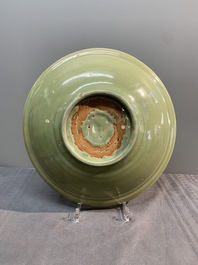 A Chinese Longquan celadon dish and a plate with floral design, Ming