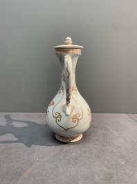 A Chinese iron-red and gilt-decorated ewer with floral design, Kangxi
