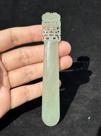 A Chinese pale celadon jade 'double happiness' hairpin on a ruyi-shaped wooden stand, 19th C.