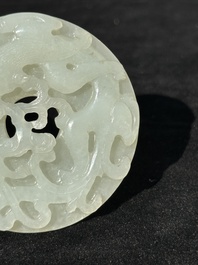 A Chinese white jade 'chilong' 'bi' disc, Qing