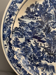 A massive Chinese blue and white 'landscape' dish, 19th C.
