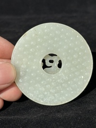 A Chinese white jade 'chilong' 'bi' disc, Qing