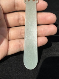 A Chinese pale celadon jade 'double happiness' hairpin on a ruyi-shaped wooden stand, 19th C.