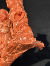 A Chinese red coral 'Sanxing' group on wooden stand, 19/20th C.