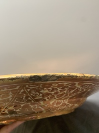 A massive Spanish Hispano-Moresque lustreware 'double eagle' dish, Manises, early 17th C.