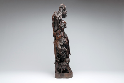 A large Chinese carved hongmu group of Fuhu Luohan and tigers, Republic