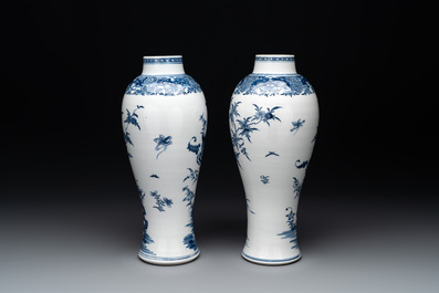 A pair of Chinese blue and white vases with floral design, Qianlong