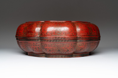 A Chinese red lacquer box and cover with floral design, 19/20th C.
