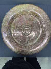 A massive Spanish Hispano-Moresque lustreware 'double eagle' dish, Manises, early 17th C.