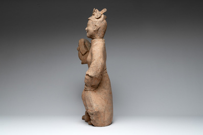 A large Chinese terracotta sculpture of a dancer, possibly Han