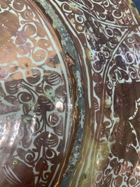 A massive Spanish Hispano-Moresque lustreware 'double eagle' dish, Manises, early 17th C.