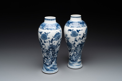 A pair of Chinese blue and white vases with floral design, Qianlong