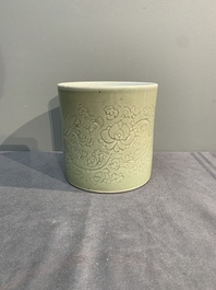 A Chinese incised celadon-glazed 'lotus scroll' brush pot, Kangxi