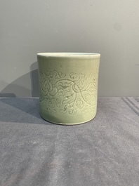 A Chinese incised celadon-glazed 'lotus scroll' brush pot, Kangxi