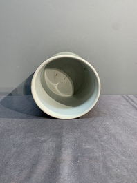 A Chinese incised celadon-glazed 'lotus scroll' brush pot, Kangxi