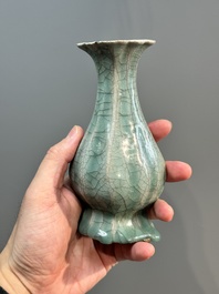 A Chinese Longquan celadon lobed bottle vase, Song