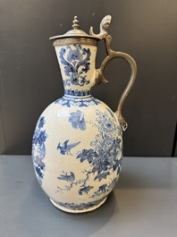 A Dutch Delft blue and white pewter-mounted armorial jug, late 17th C.