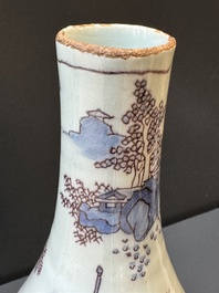 A Dutch Delft blue, white and manganese chinoiserie bottle vase, late 17th C.