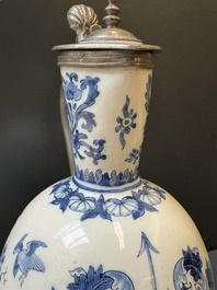 A Dutch Delft blue and white pewter-mounted armorial jug, late 17th C.