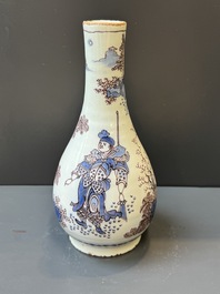 A Dutch Delft blue, white and manganese chinoiserie bottle vase, late 17th C.
