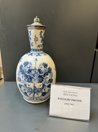 A Dutch Delft blue and white pewter-mounted armorial jug, late 17th C.