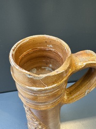 A Raeren stoneware 'Schnelle' with the coat of arms of the Holy Roman Emperor Rudolph II, dated 1583