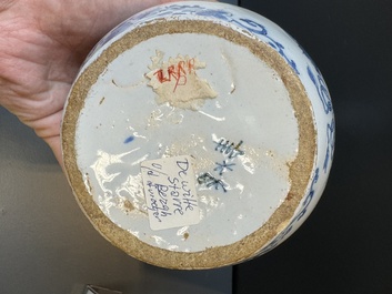 A Dutch Delft blue and white pewter-mounted armorial jug, late 17th C.