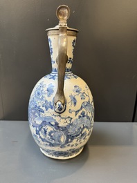 A Dutch Delft blue and white pewter-mounted armorial jug, late 17th C.