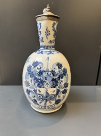A Dutch Delft blue and white pewter-mounted armorial jug, late 17th C.