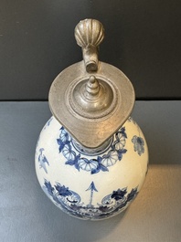 A Dutch Delft blue and white pewter-mounted armorial jug, late 17th C.