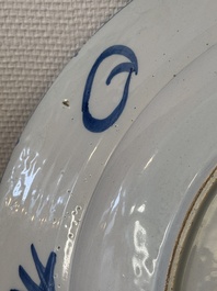 A large blue and white Dutch Delft chinoiserie dish, late 17th C.