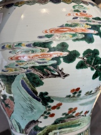 A pair of Chinese famille verte 'Shou Lao' vases, Kangxi