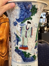 A Chinese wucai 'gu' vase with narrative design, Transitional period