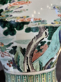 A pair of Chinese famille verte 'Shou Lao' vases, Kangxi