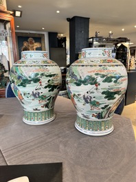 A pair of Chinese famille verte 'Shou Lao' vases, Kangxi
