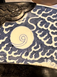 A massive Chinese blue and white reverse-decorated  'dragon' charger with bronze mounts, Chuxiu Gong Zhi mark, Guangxu