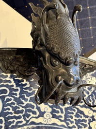 A massive Chinese blue and white reverse-decorated  'dragon' charger with bronze mounts, Chuxiu Gong Zhi mark, Guangxu