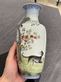 A Chinese famille rose vase, Qianlong and Shinian 世寧 mark, 20th C., and a qianjiang cai vase, signed Ren Huanzhang 任煥章, dated 1942