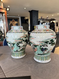 A pair of Chinese famille verte 'Shou Lao' vases, Kangxi