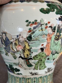 A pair of Chinese famille verte 'Shou Lao' vases, Kangxi