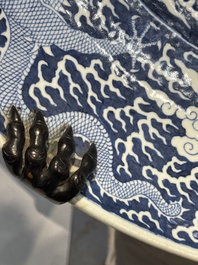 A massive Chinese blue and white reverse-decorated  'dragon' charger with bronze mounts, Chuxiu Gong Zhi mark, Guangxu