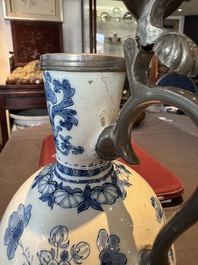 A Dutch Delft blue and white pewter-mounted armorial jug, late 17th C.