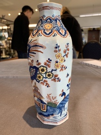 A pair of polychrome Dutch Delft octagonal chinoiserie vases, 18th C.